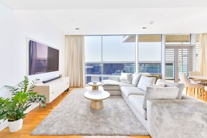 Luxury Apartment, 2 Bedrooms, Balcony, Sea View | Living area | 75-inch Smart TV with satellite channels, TV, Netflix