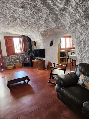 Family House, 3 Bedrooms | Living area | 70-cm flat-screen TV with digital channels, TV, DVD player - Cuevas Andalucia (Baza)