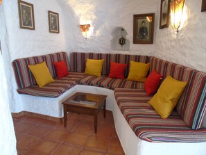 Comfort House | Living area | 70-cm flat-screen TV with digital channels, TV, DVD player - Cuevas Andalucia (Baza)