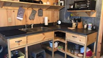 Fridge, microwave, stovetop, coffee/tea maker