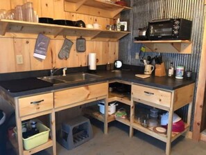 Fridge, microwave, stovetop, coffee/tea maker