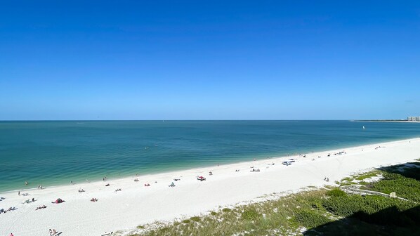 On the beach, sun-loungers, beach towels