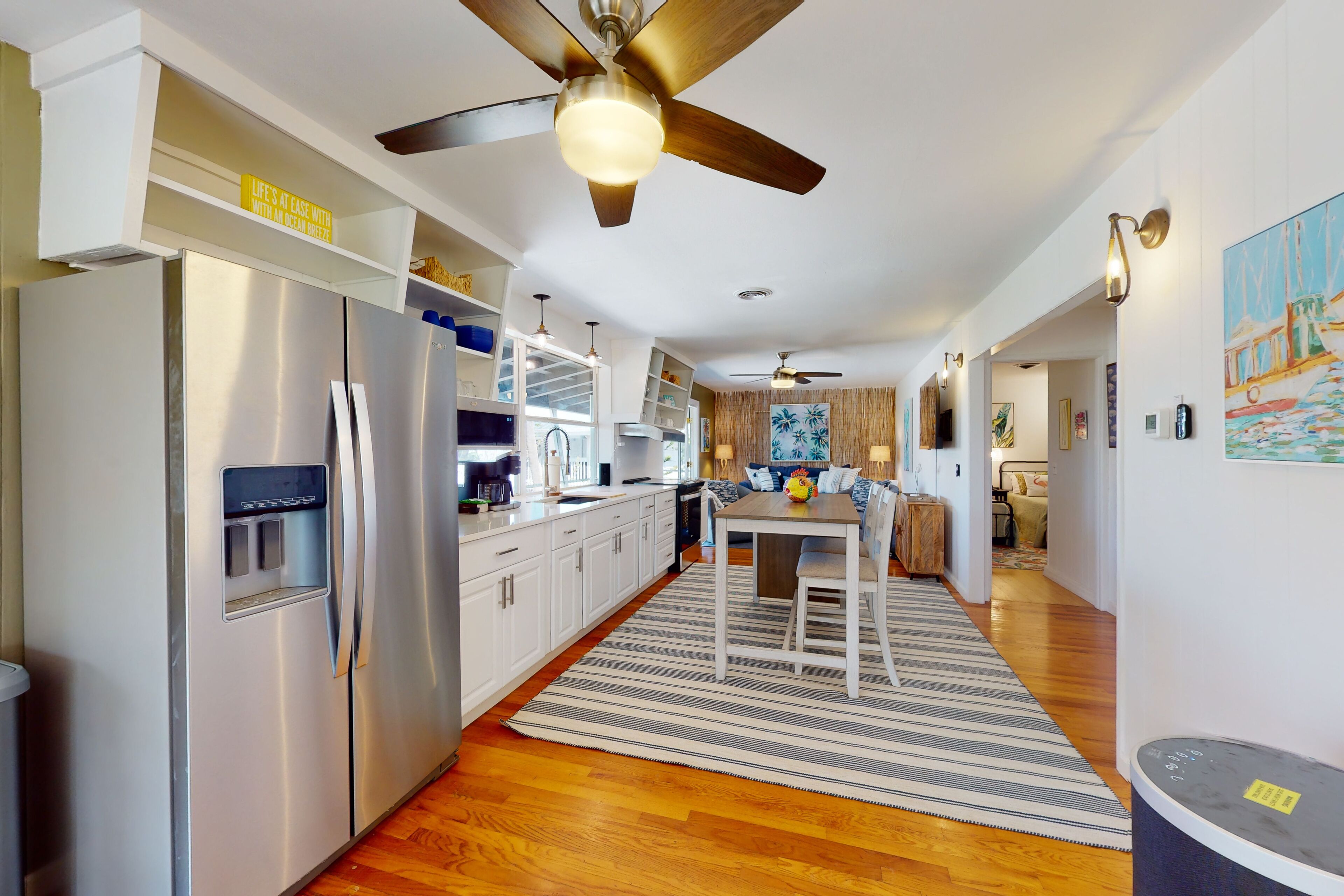 Tropical Palm Island home steps from the beach with grill, outdoor shower, dock