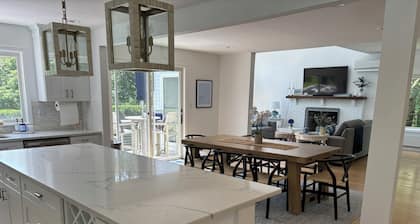 Modern coastal retreat w/ pool, close to beaches and golf courses.