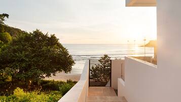 A modern building with a view of the ocean.