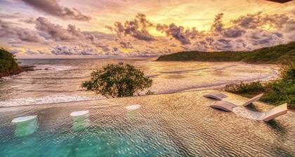 Brand New Beach front 5 bedroom house steps from the beach