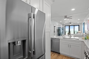 Fridge, microwave, oven, stovetop - The Gulf Front- 2 bedroom beachfront condo with incredible views (Holmes Beach)