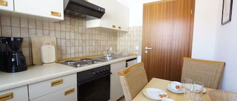Fridge, oven, coffee/tea maker, toaster