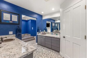 Shower, jetted bath, towels, soap