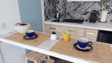 Fridge, stovetop, dishwasher, electric kettle