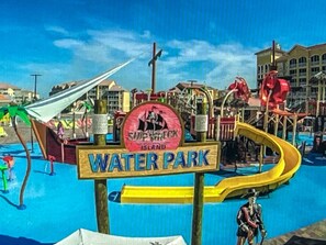 Experience the thrill of Water Park at Simplicity Island, featuring slides and play structures for all ages.