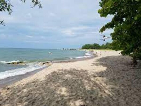 Enjoy a serene beach experience with access to the calm sea.