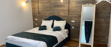 Chambre Deluxe double ou avec lits jumeaux | Couette en duvet, décor unique, ameublement unique