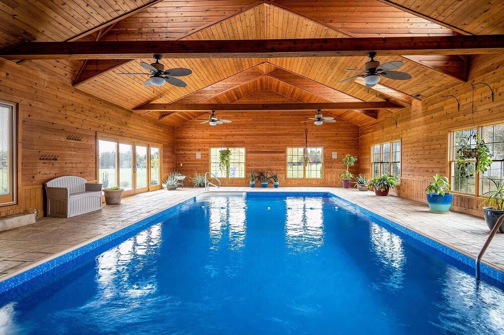 Gorgeous Home featuring an Indoor Heated Pool, Gourmet Kitchen & Outdoor Spaces