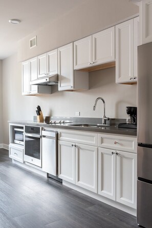 Suite, 1 Bedroom, Private Bathroom | Private kitchen | Fridge, microwave, oven, stovetop - Bywater Suite Hotel  (New Orleans)