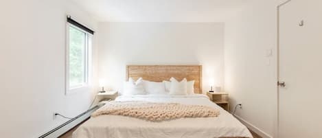 Second floor Primary bedroom overlooking the pool and bucolic views