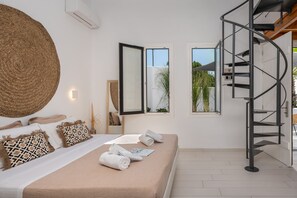 Egyptian cotton sheets, premium bedding, down duvets, in-room safe