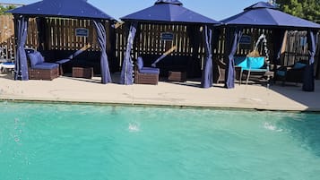Outdoor pool, open 10:00 AM to 10:00 PM, cabanas (surcharge)