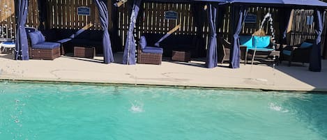 Outdoor pool, open 10:00 AM to 10:00 PM, cabanas (surcharge)