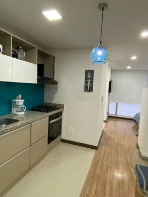 Private kitchen - Confortable Apartaestudio-en el Único Club House Armenia (Armenia)