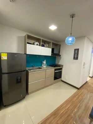 Private kitchen - Confortable Apartaestudio-en el Único Club House Armenia (Armenia)
