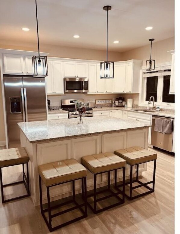 Refrigerador, microondas, horno y parrilla de estufa