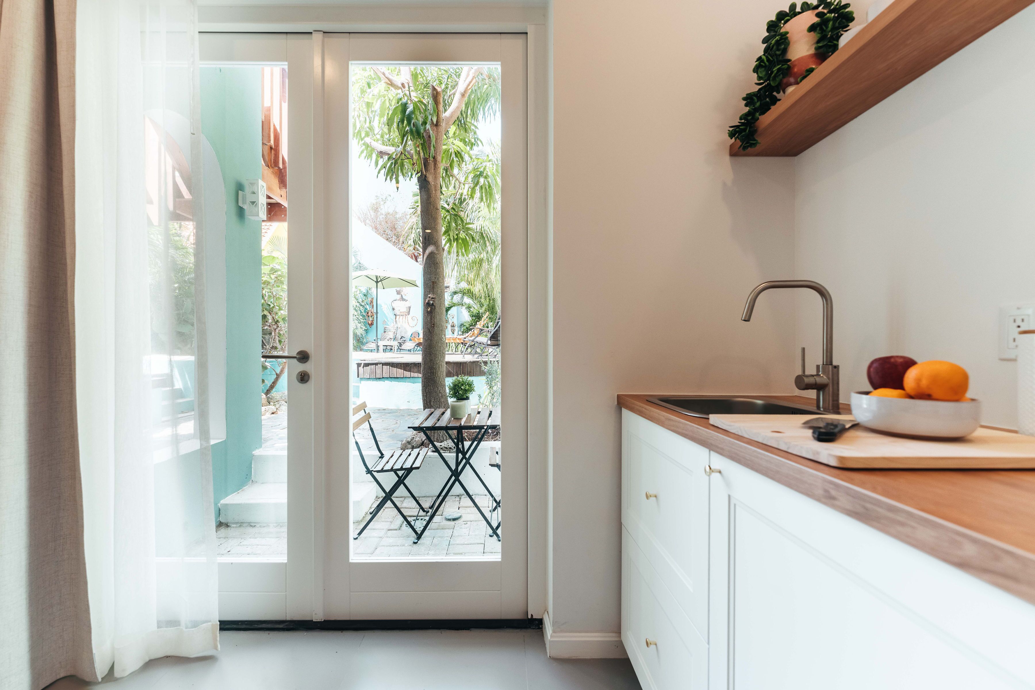 Full-sized fridge, coffee/tea maker, coffee grinder, paper towels