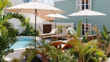 2 outdoor pools, open 8:00 AM to 10:00 PM, pool umbrellas, sun loungers