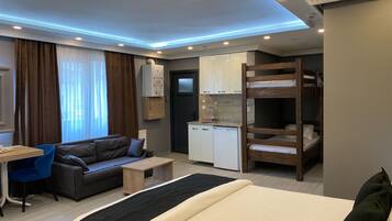 Family Room | Premium bedding, individually decorated, individually furnished, desk