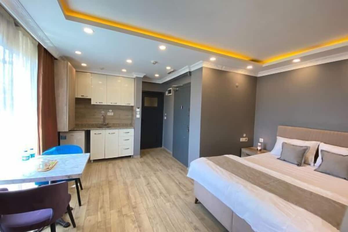 Premium bedding, desk, laptop workspace, soundproofing