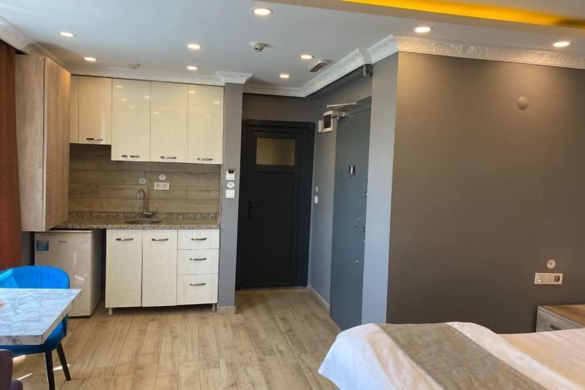 Premium bedding, desk, laptop workspace, soundproofing