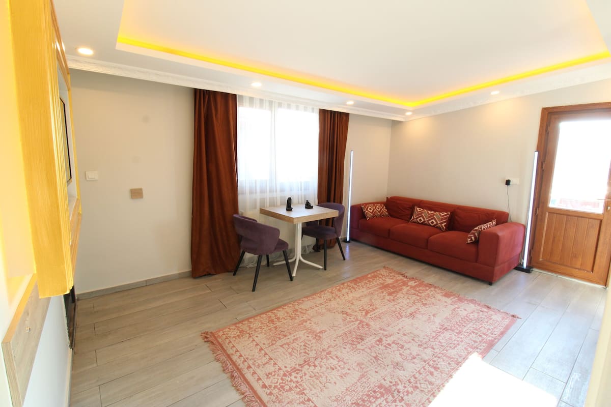 Quad Room | Living area | 32-inch LCD TV with satellite channels, TV