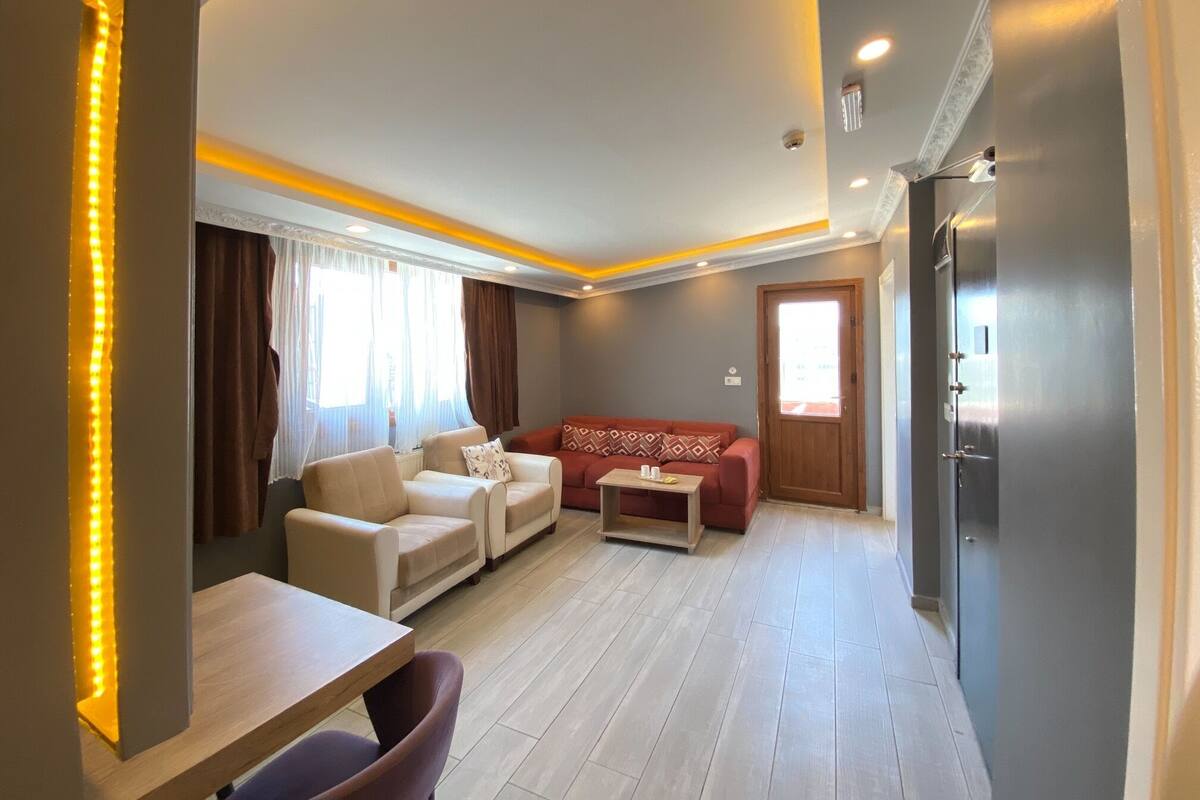 Family Room | Premium bedding, desk, laptop workspace, soundproofing