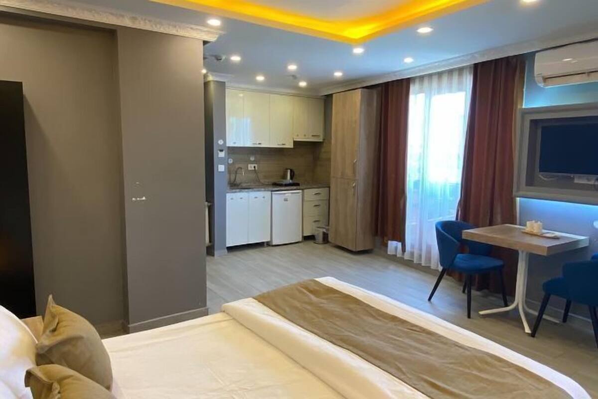Premium bedding, desk, laptop workspace, soundproofing