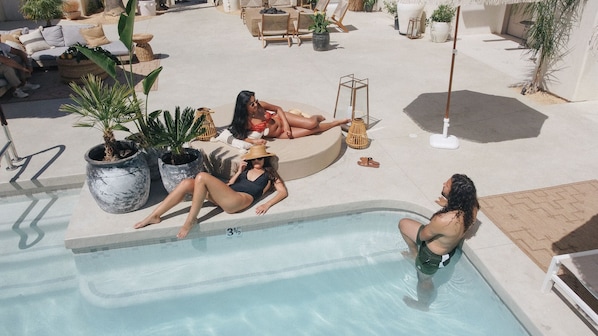 Outdoor pool, open 8:00 AM to 10:00 PM, free pool cabanas