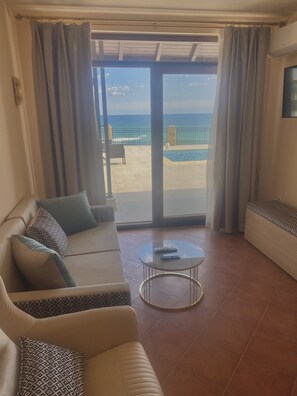 Condo | Área de estar | TV de tela plana