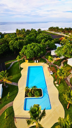 Outdoor pool, open 8:00 AM to 10:30 PM, sun loungers
