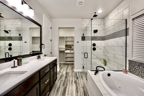 Jetted tub, hair dryer, towels, soap