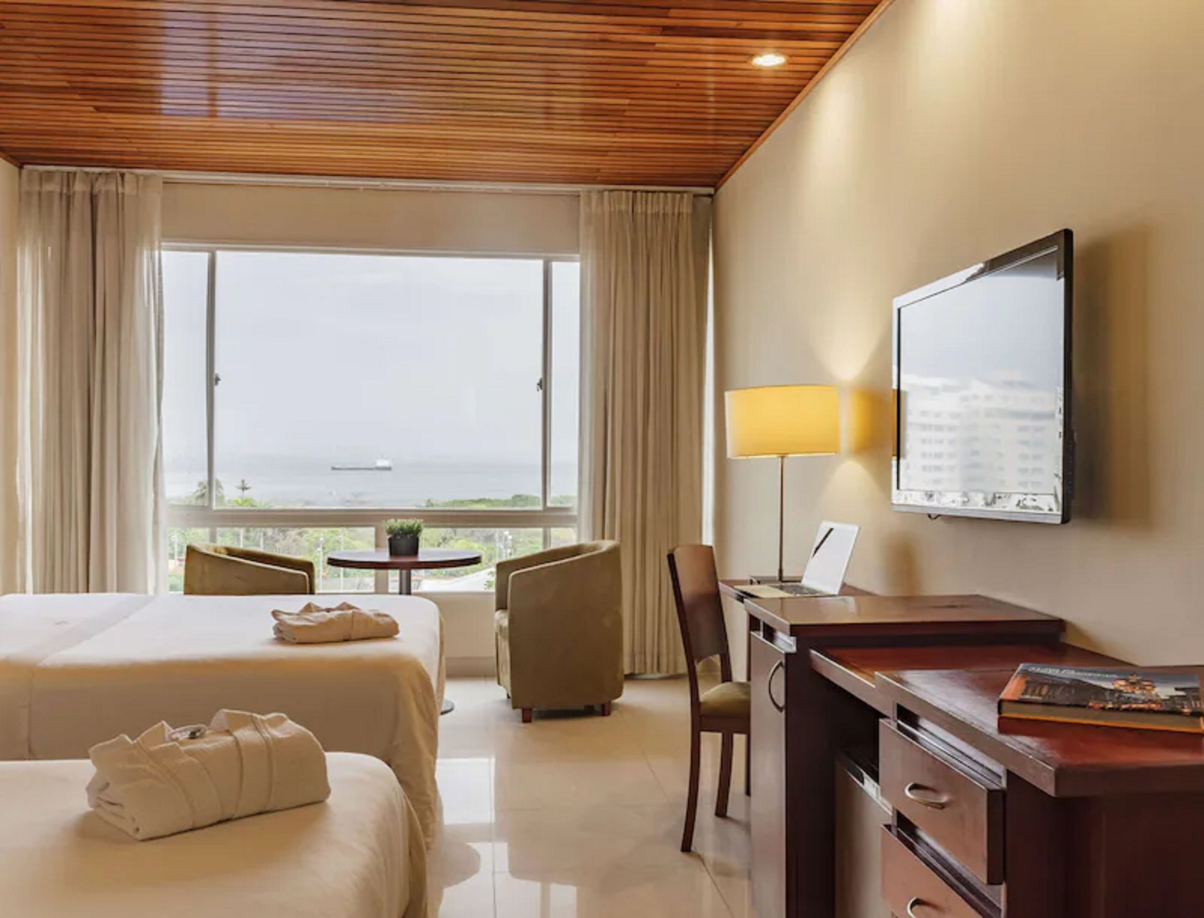 Foto - \"room in Lodge - Hc-vp Hotel Room Facing The Sea With Pool Air Conditioning And Wifi\"