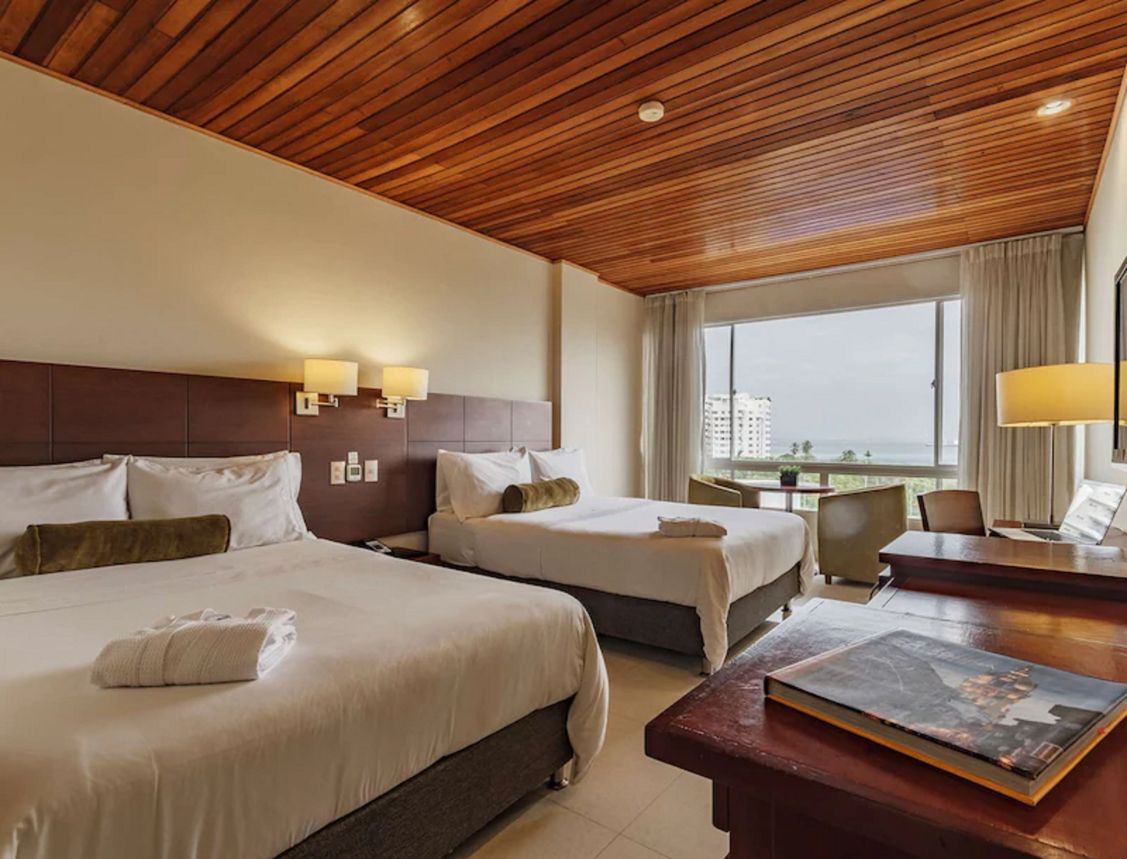Foto - \"room in Lodge - Hc-vp Hotel Room Facing The Sea With Pool Air Conditioning And Wifi\"