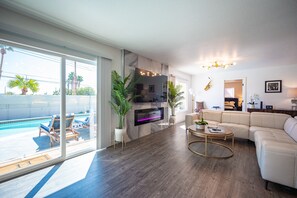Smart TV, fireplace, books, music library