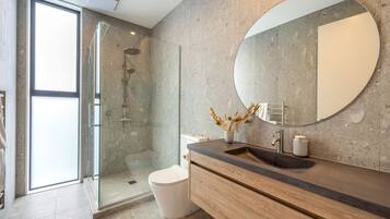 Shower, hair dryer, towels, soap