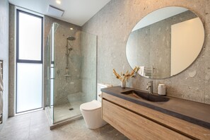 Shower, hair dryer, towels, soap