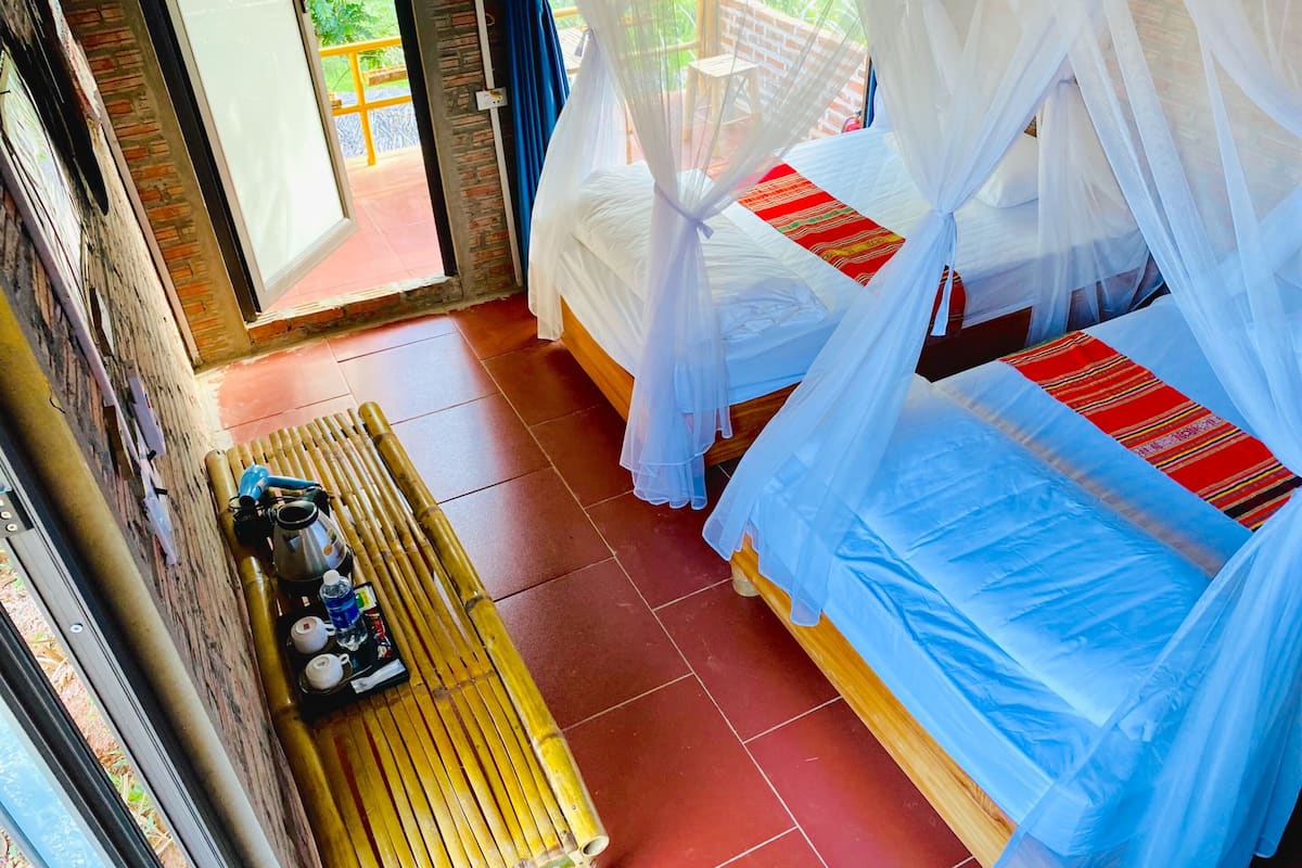 Bungalow Deluxe | 1 dormitorio, colchones con acolchado adicional, wifi gratis
