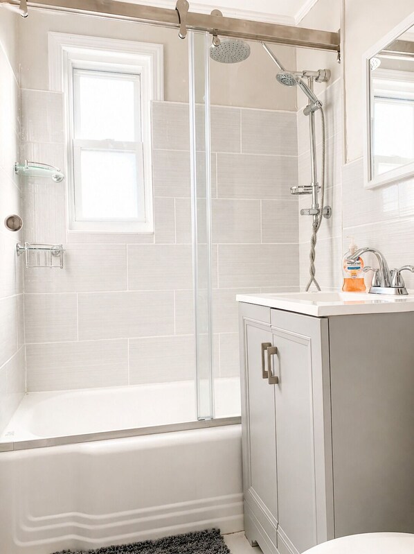 Shower, towels, soap, shampoo