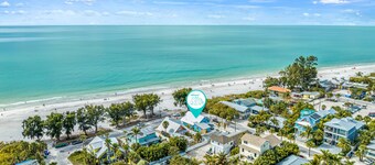 Salty Sister: Stunning Beachfront Vacation Home with Heated Pool, Steps from Anna Maria Island Beach