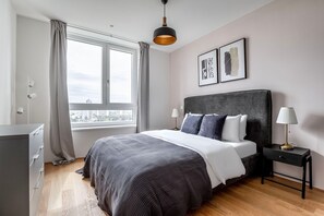 2 dormitorios, tabla de planchar con plancha, wifi y ropa de cama