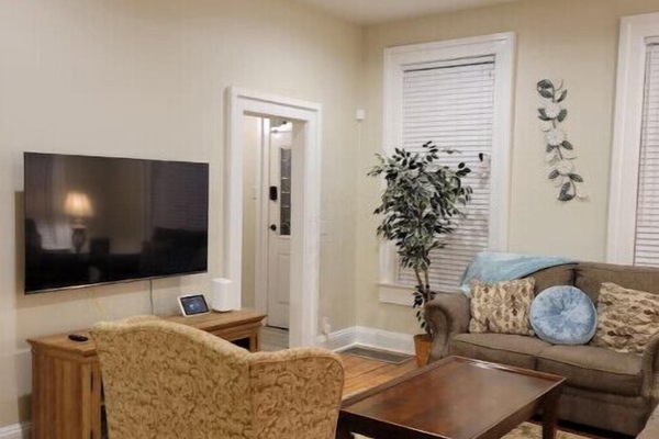 1st floor, living room (2 stools in dining room available for extra seating)