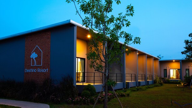 A modern building with a sign reading "Destino Resort." - Destino Hotel Surin (Surin)