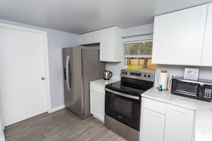 Fridge, microwave, dishwasher, coffee/tea maker